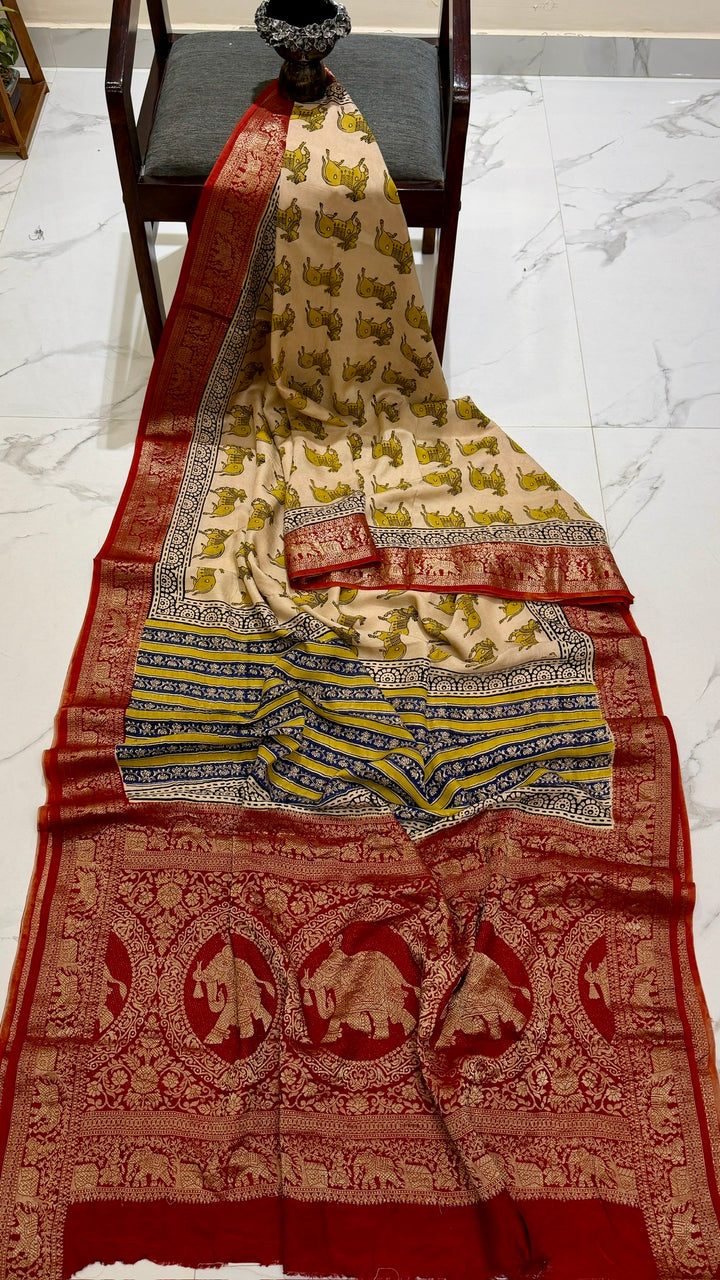 Pure Dola Silk Ajrakh Handblock Printed Saree in Cream and Deep Red with Cow Motifs
