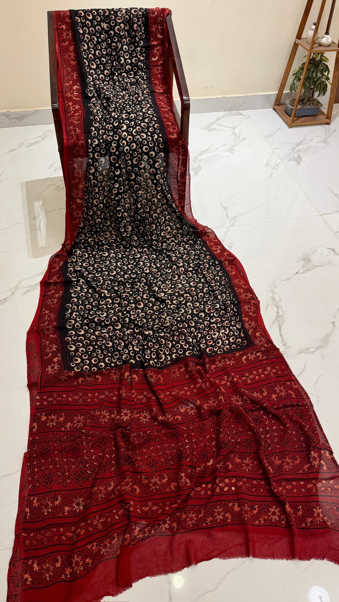 Black Abstract Eye Motif Georgette Saree