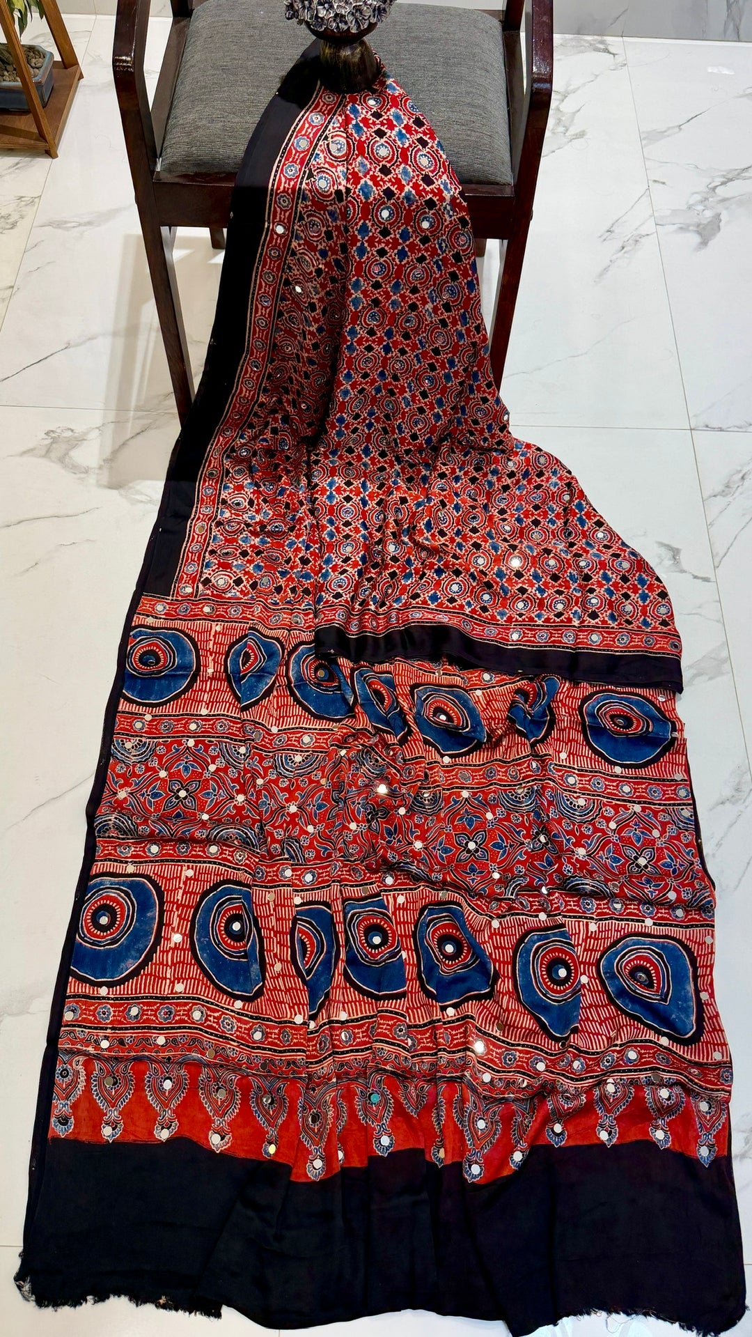 Hand Block Printed Ajrakh Modal Silk Saree with Mirror Work in Brick Red & Indigo