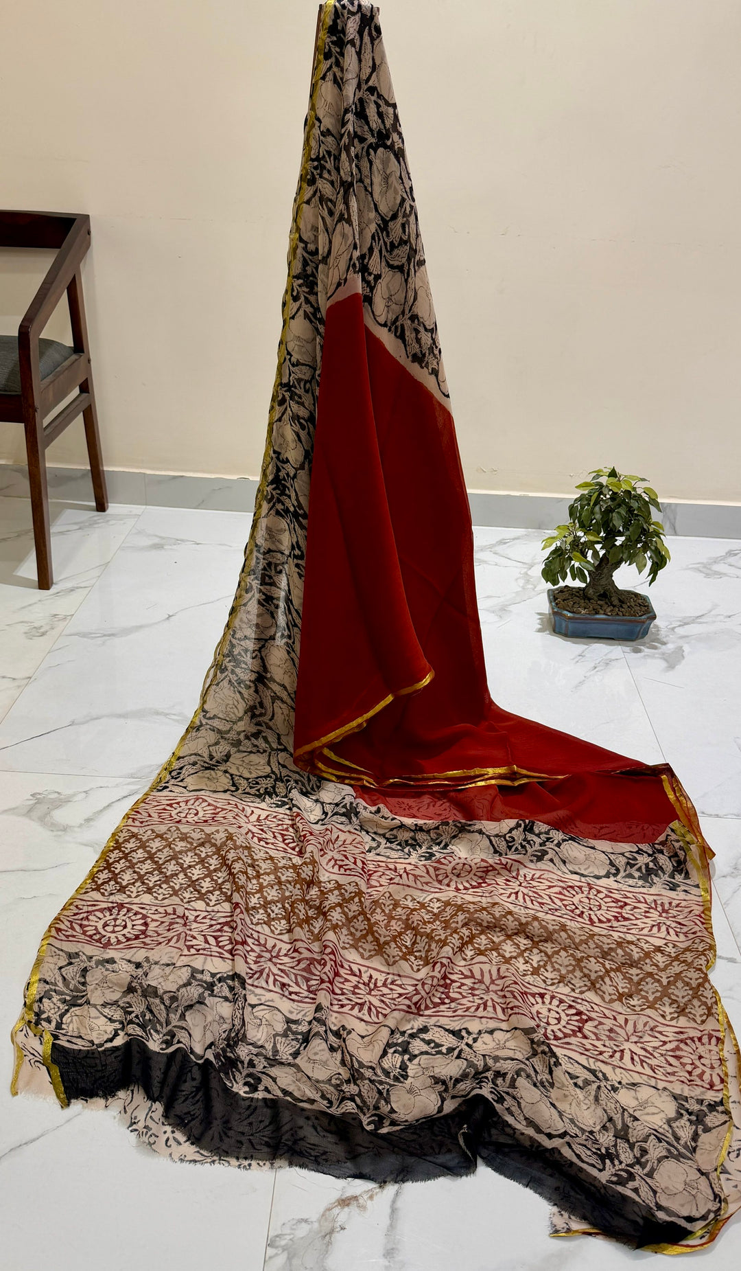 Elegant Ruby Red Premium Chiffon Saree featuring Bold Black Floral Hand-Block Prints