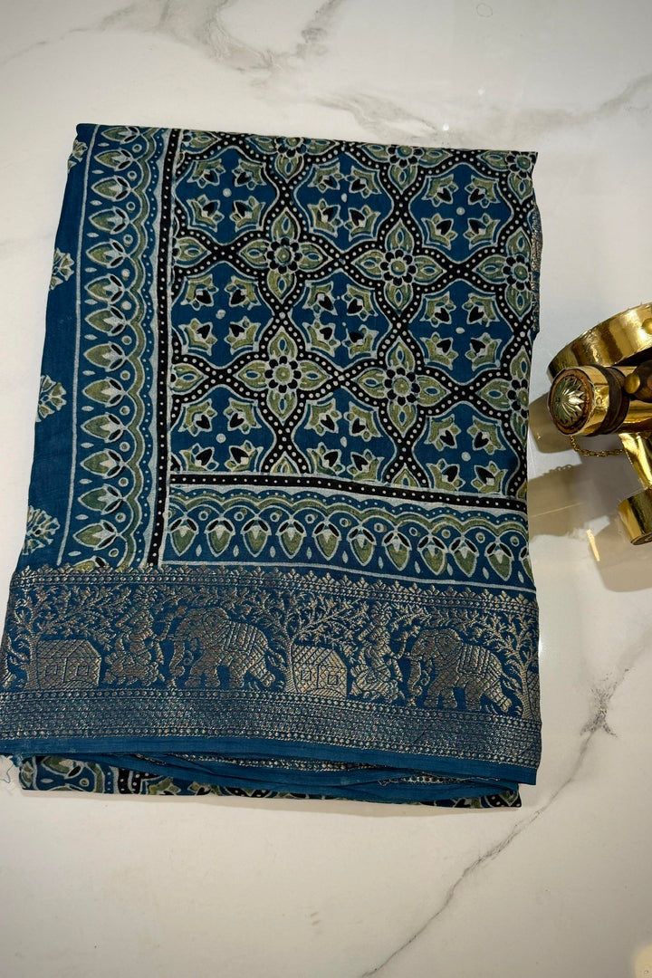Sky Blue Dola Silk Ajrakh Saree with Traditional Motifs & Rich Gold Zari Border