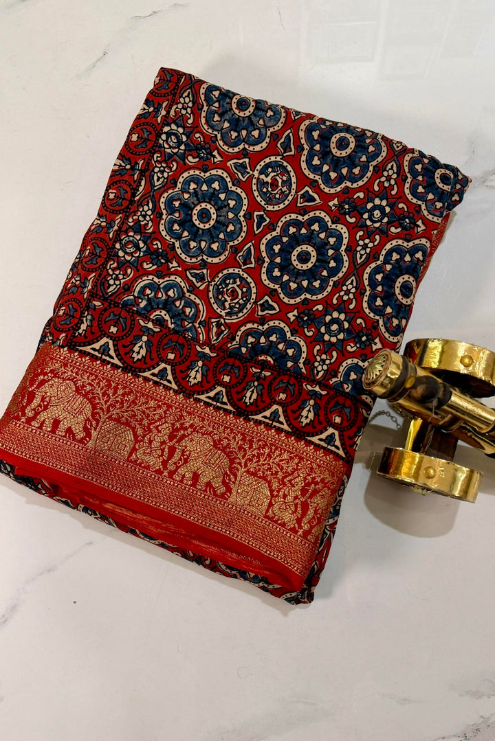 Red Dola Silk Ajrakh Print Saree with Floral Motifs & Rich Gold Zari Wedding Border