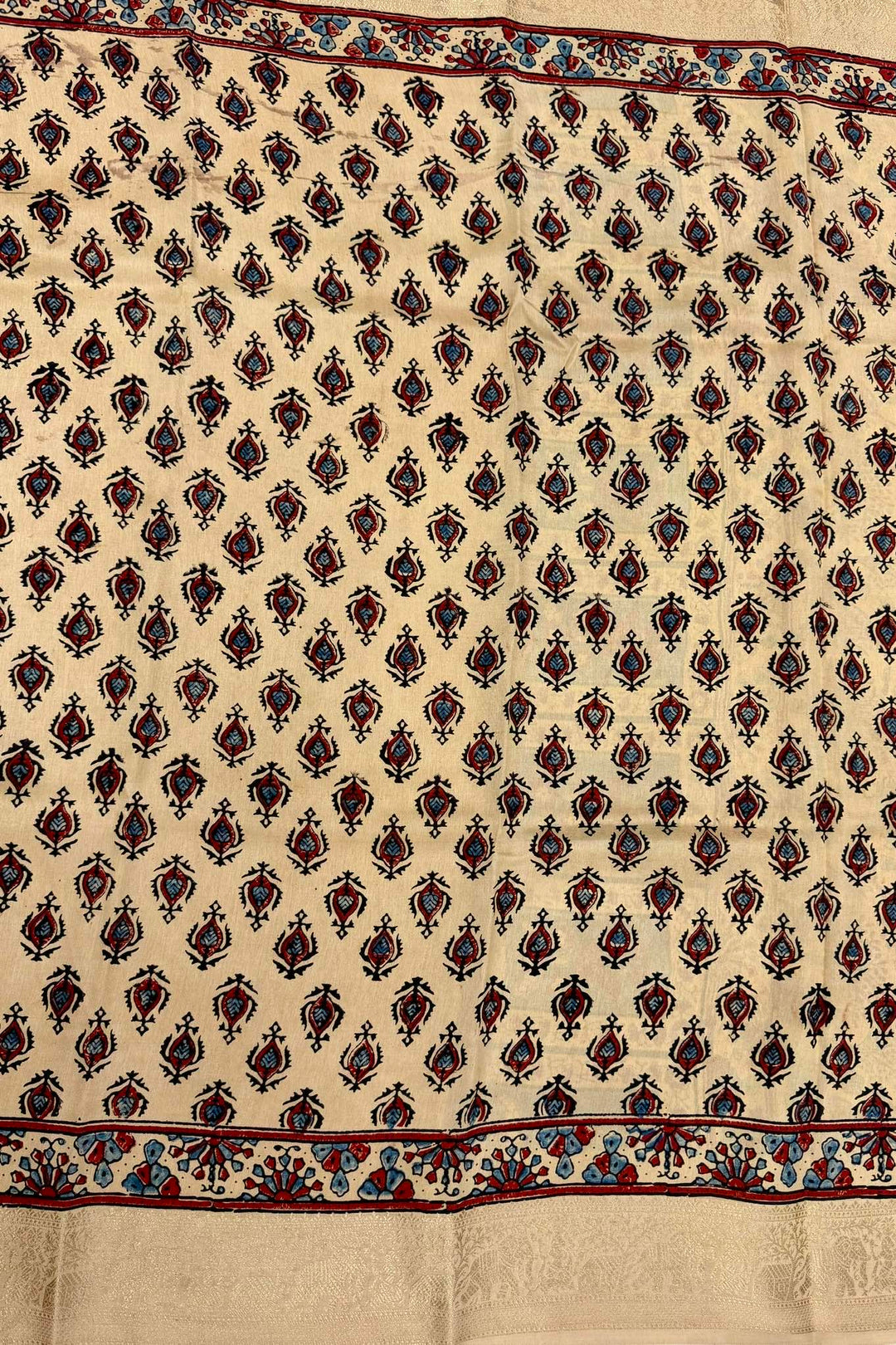 Beige Dola Silk Ajrakh Print Saree with Intricate Floral Motifs & Rich Gold Zari Border
