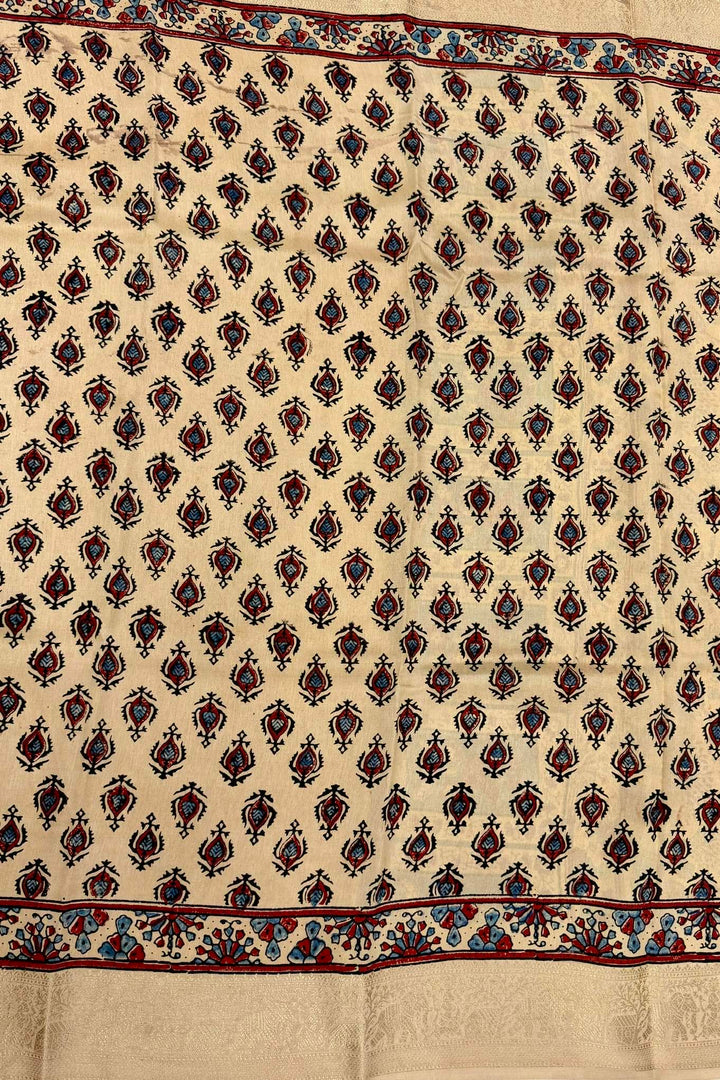 Beige Dola Silk Ajrakh Print Saree with Intricate Floral Motifs & Rich Gold Zari Border