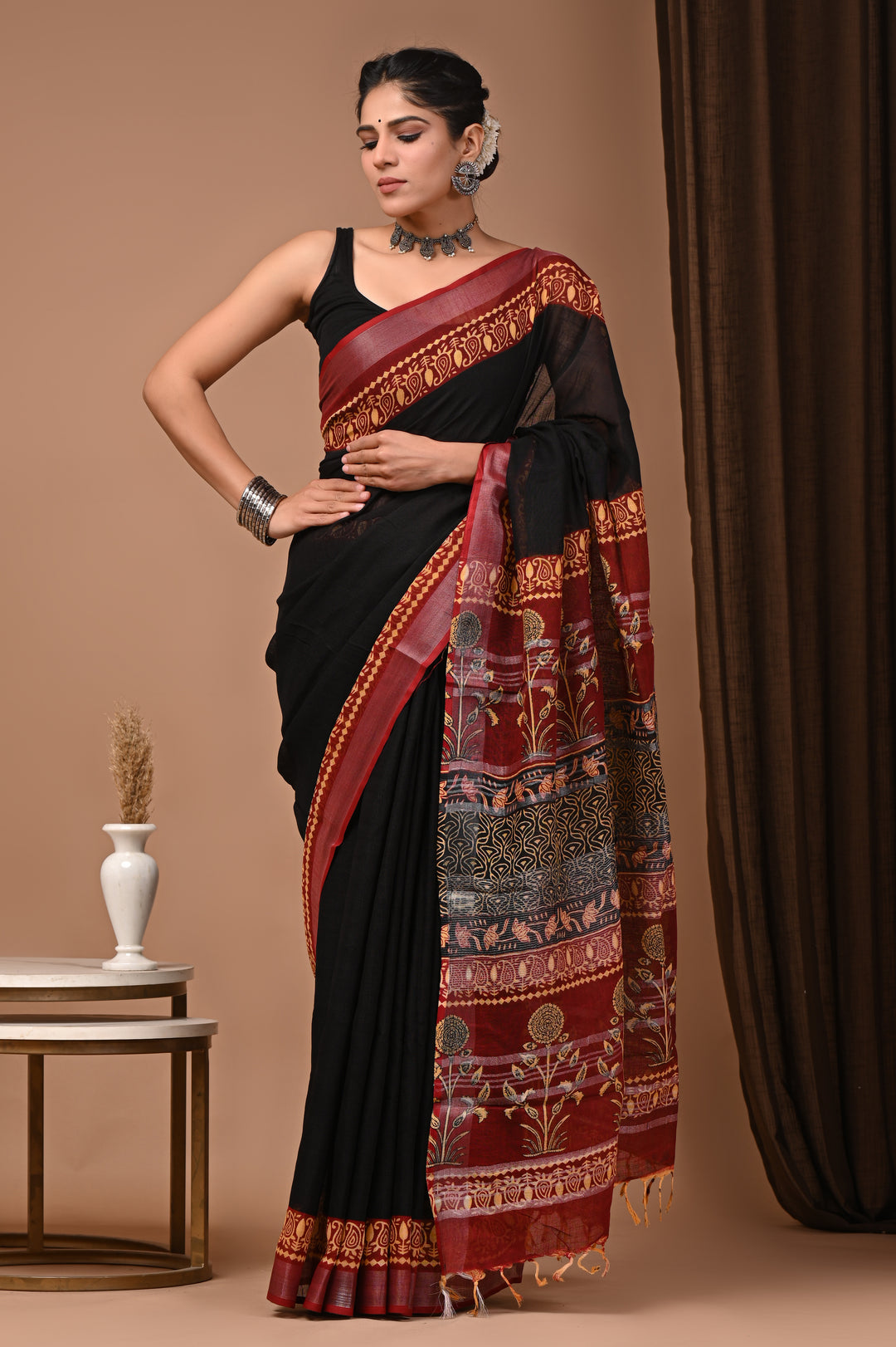 Classic Black Saree with Rich Red Madhubani Style Pallu