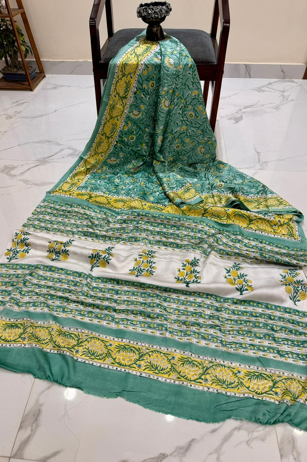 Mint Green Floral Jaal Modal Silk Saree with White Base Pallu