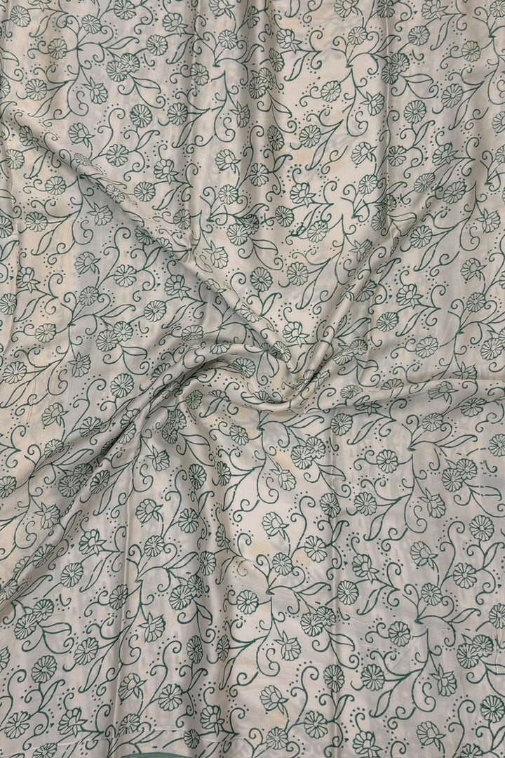 Mint Green Floral Jaal Modal Silk Saree with White Base Pallu