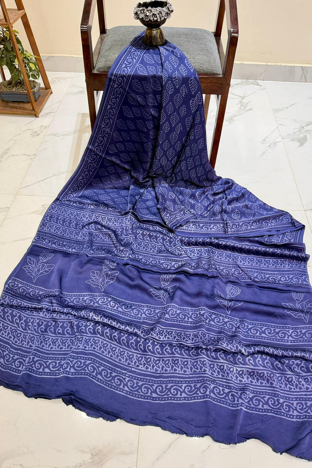 Pure Modal Silk Saree with Intricate Leaf Patterns and Decorative Pallu