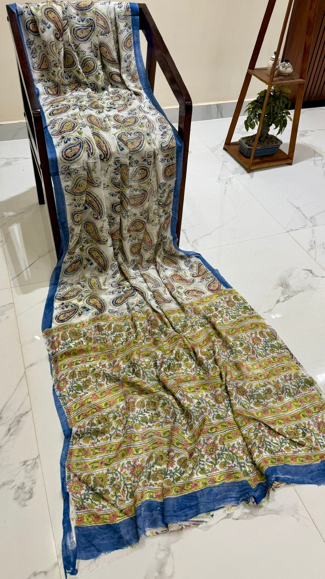 White Georgette Saree with Blue Border & Multicolored Handblock Paisleys