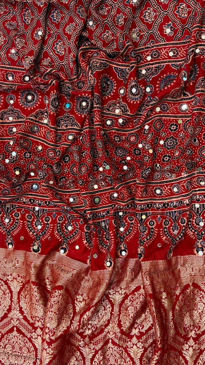 Deep Maroon and Black Pure Ajrakh Dola Silk Saree with Traditional Mirror Handwork