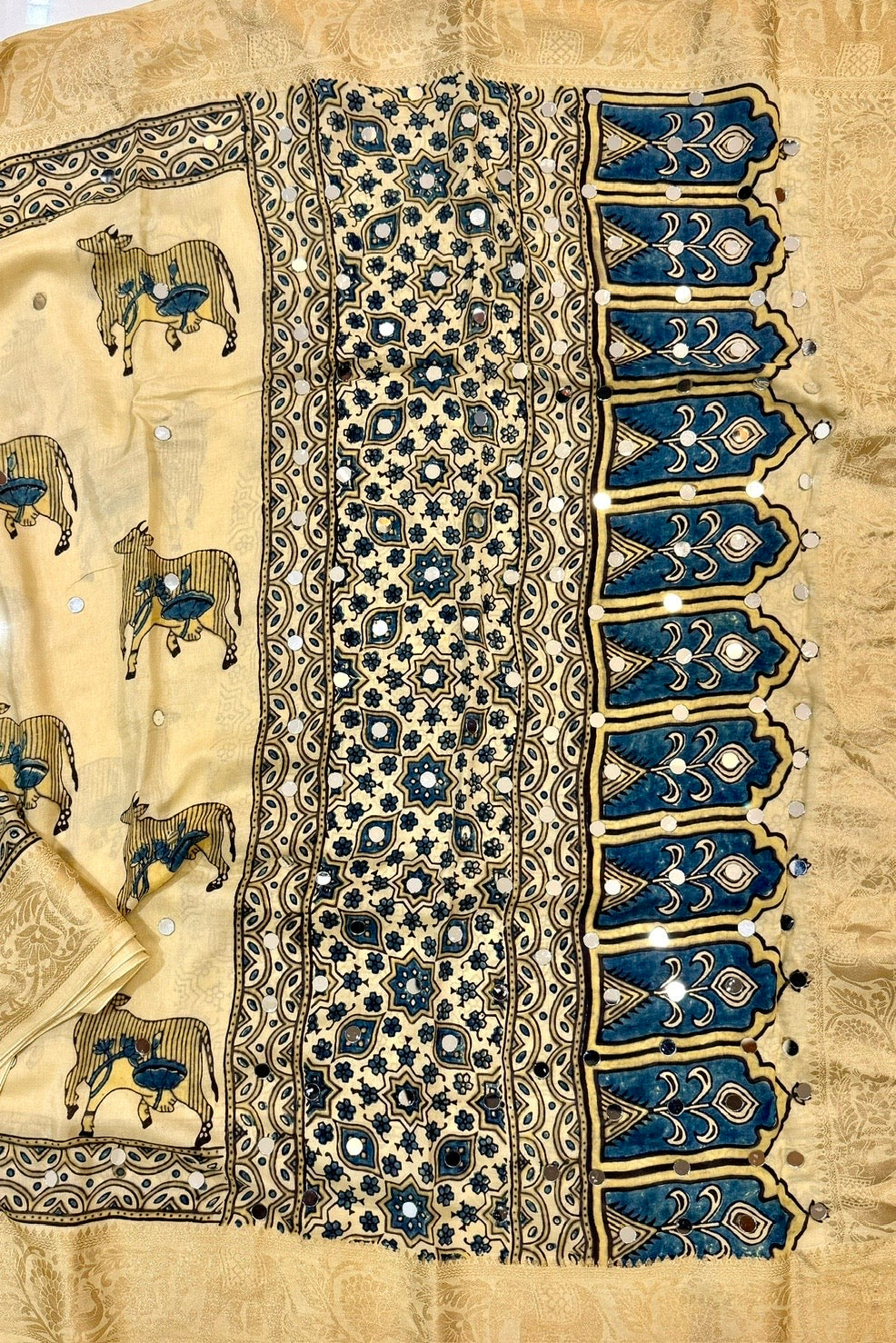 Off-White Dola Silk Ajrakh Saree with Kamdhenu Cow Prints & Mirrors