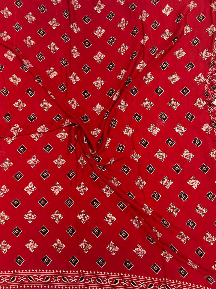 Ruby Red Artisan-Made Ajrakh Saree with Elegant Paisley Border