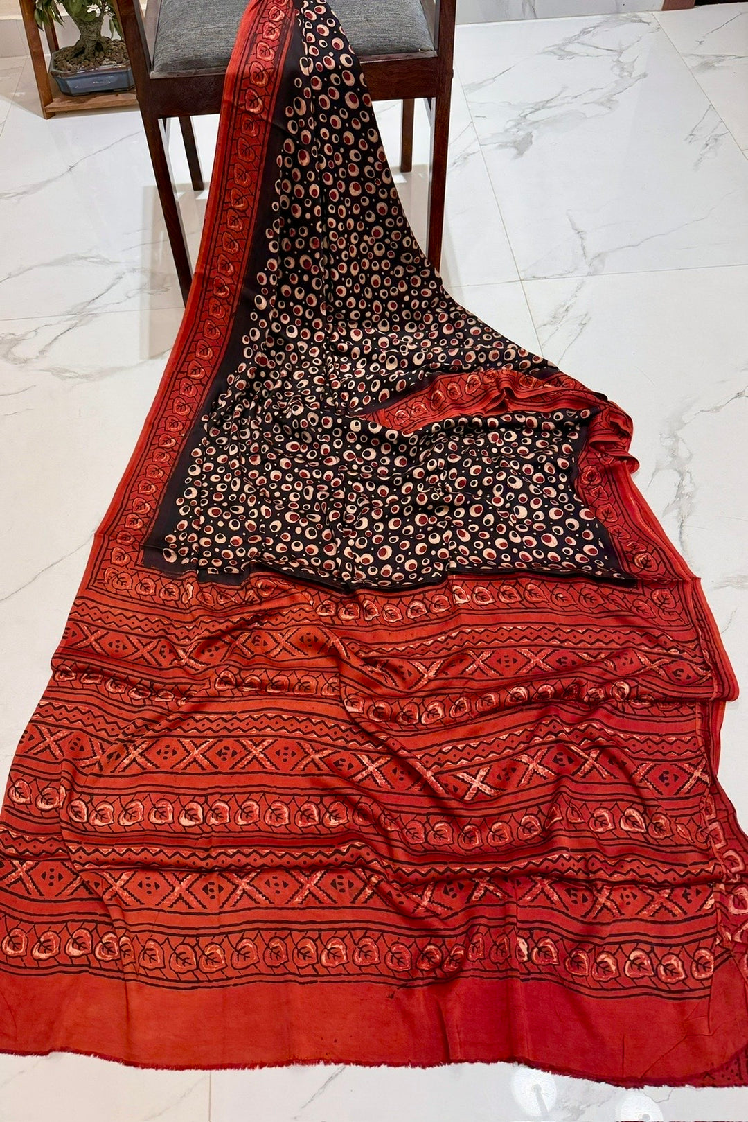 Pure Modal Silk Saree with Unique Abstract Prints and Rich Red Border