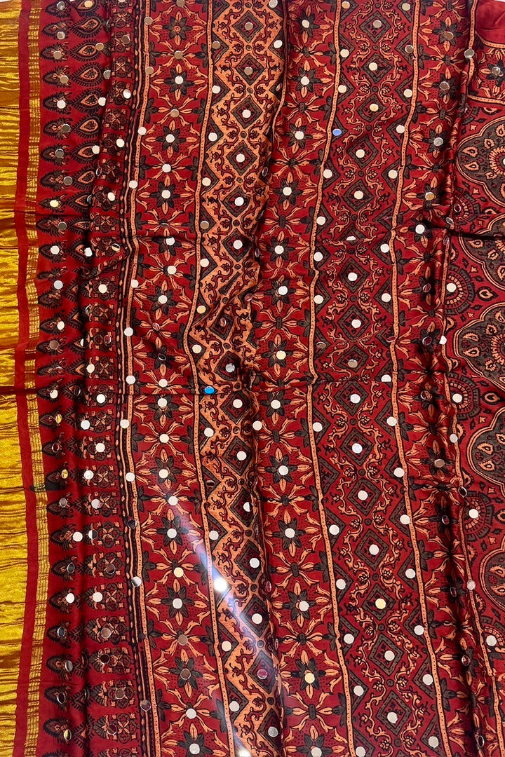 Deep Maroon Modal Silk Ajrakh Handblock Printed Saree with Real Mirror Work & Zari Tissue Pallu