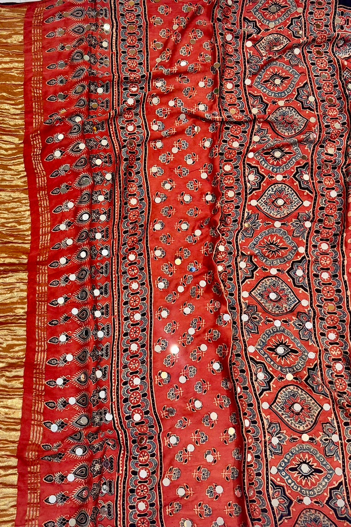 Rust Orange Modal Silk Ajrakh Handblock Printed Saree with Real Mirror Work & Crushed Tissue Pallu